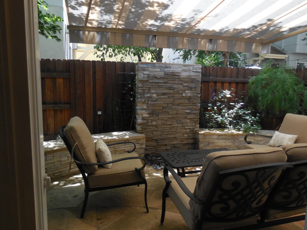 Outdoor sitting area with a canopy